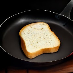 a piece of white bread that has been fried in a pan with butter for two minutes.