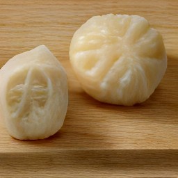celeriac that has been peeled with a peeler.