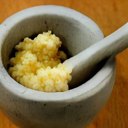 the garlic is crushed into small pieces.