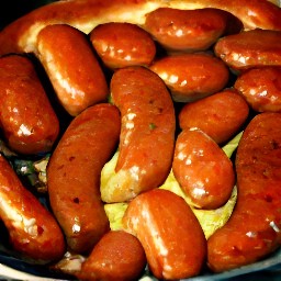 the batter is poured over the roasting tin and then the tin is put back in the oven to bake for 10 minutes.