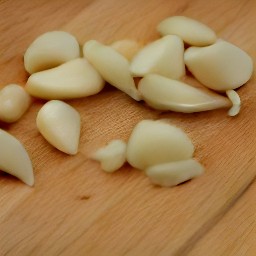 the output is cubes of french baguette and chopped garlic.