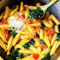 a bowl of pesto and ricotta mixture with shaved parmesan cheese on top.