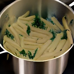 a cooked penne-kale dish.