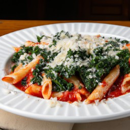 
Delicious Italian-style cherry tomato pasta made with penne, kale and parmesan cheese - a soy-free vegetarian delight.