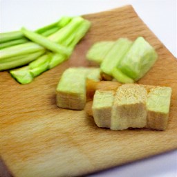 cut potatoes, celery sticks, and bread into cubes.