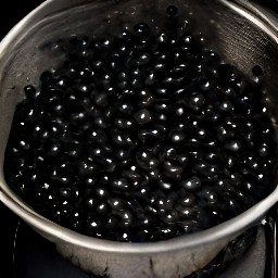 black beans that have been rinsed in a colander.