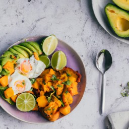 

This delicious and nutritious gluten-free, nuts-free brunch or side dish combines creamy sweet potatoes with red onions, black beans, eggs and avocados for a spicy kick. Topped with cheese tortilla chips and hot sauce!