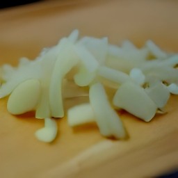 chopped onion, garlic, and red chili peppers.