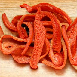 strips of red bell pepper with the seeds removed.