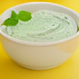 a pea and mint dip has been transferred to a serving bowl.