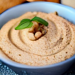 a thick purée divided into pots, with chopped walnuts added.