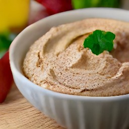 a thick purée made from combining chickpeas, garlic, roasted red bell peppers, tahini, and lemon juice.